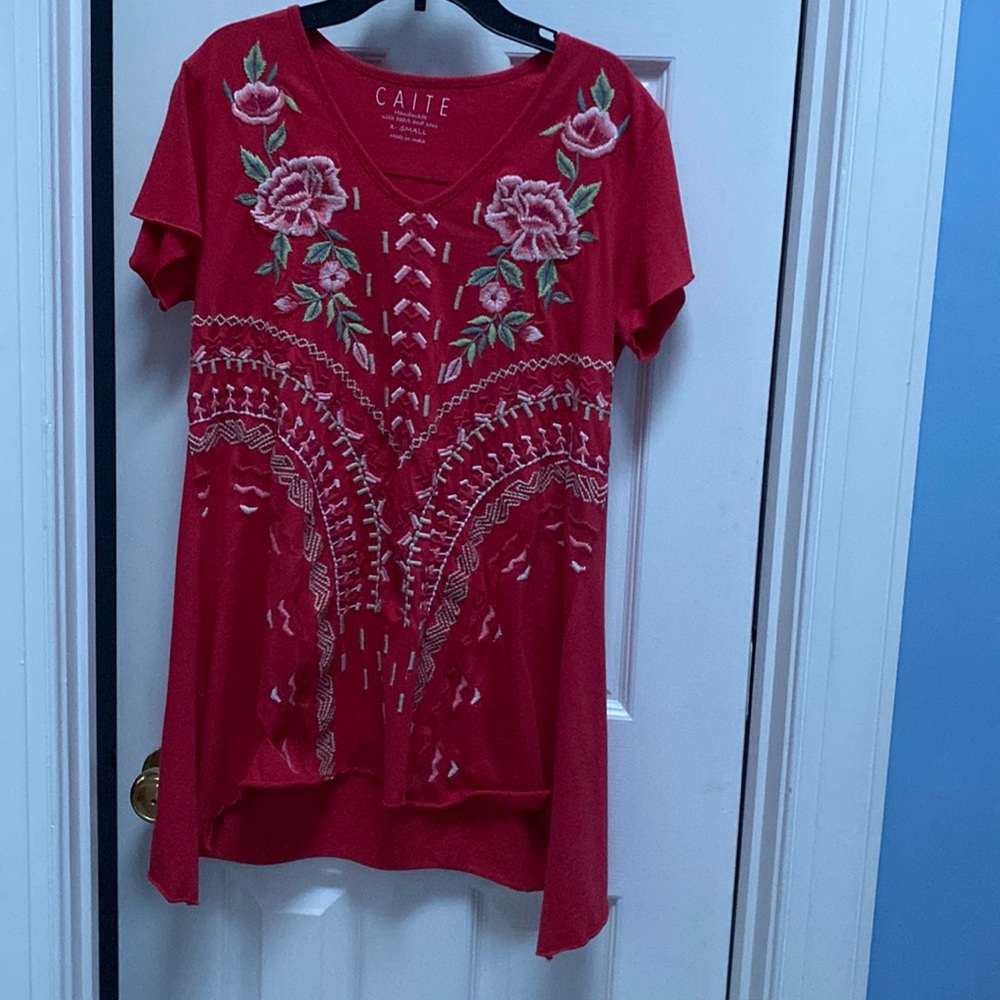A luscious rose-colored tunic or dress
